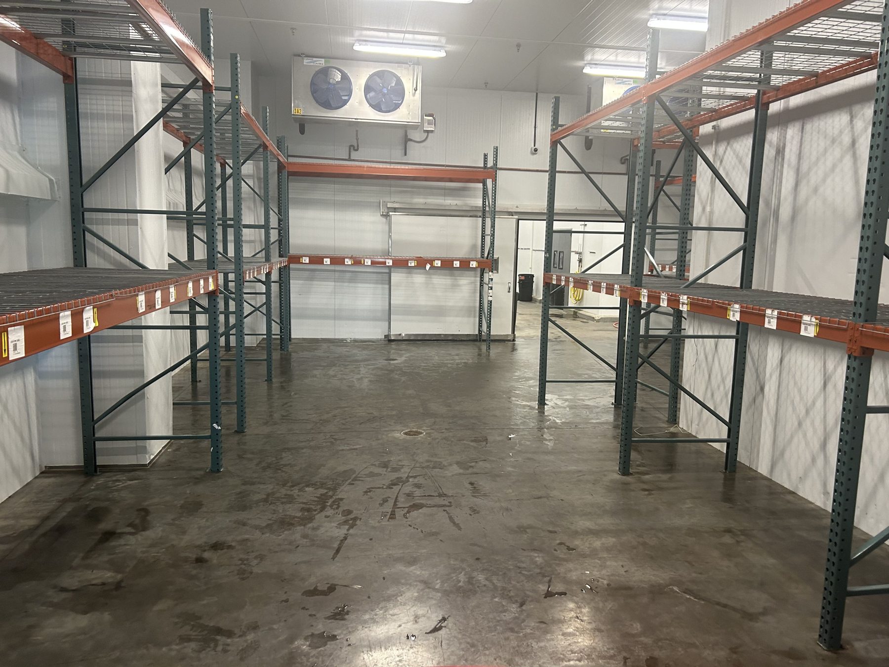Box cooler with pallet racking for finished product