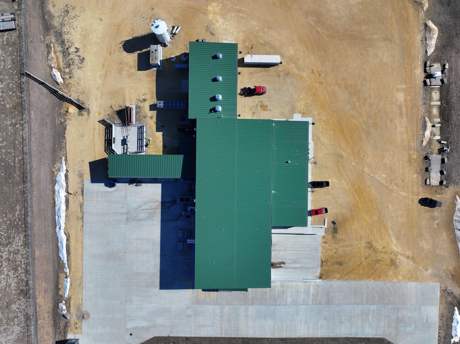 Overhead aerial view of the plant roof, yard, and parking